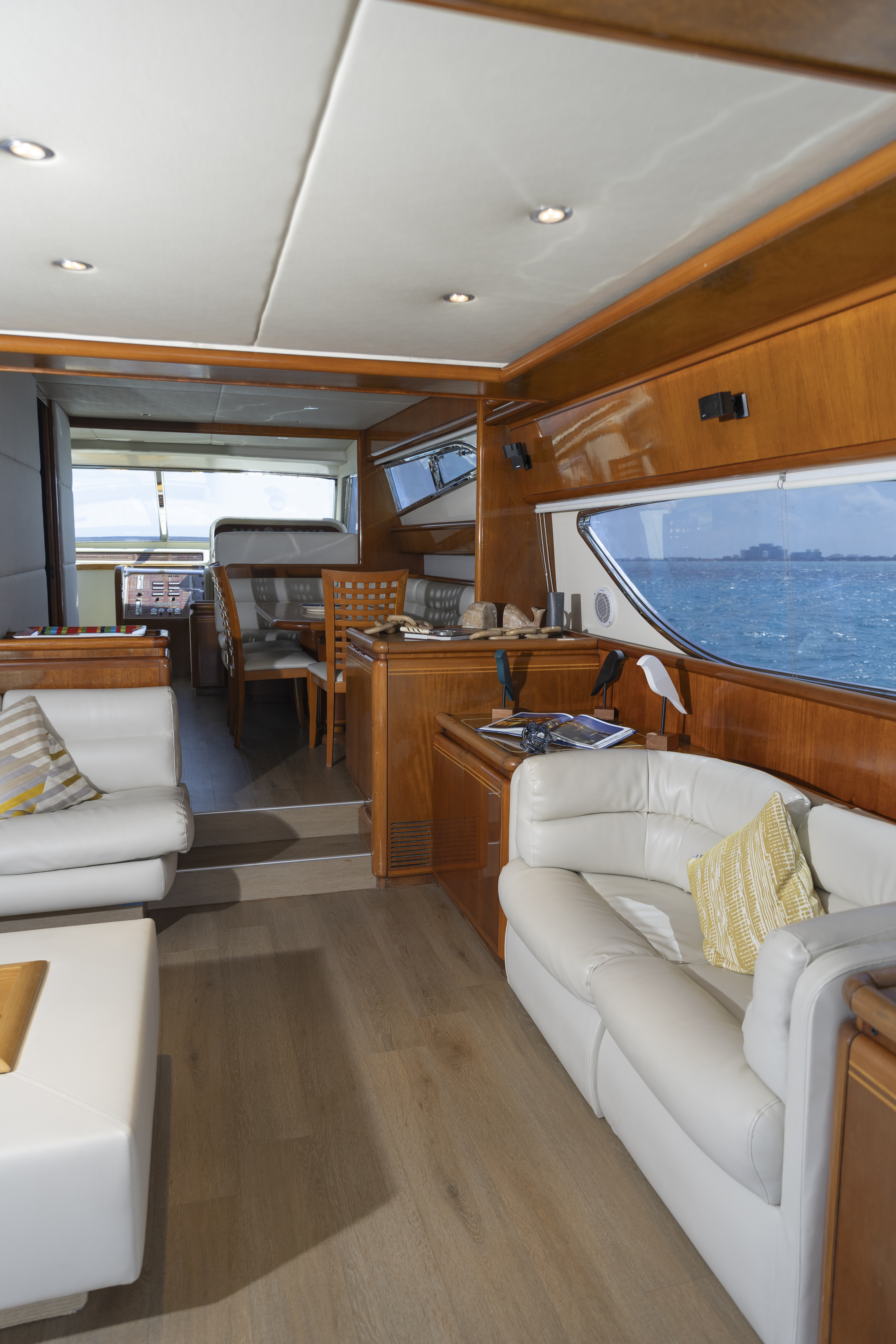 74ft Ferretti yacht rental Miami - comfortable lounge area for group celebrations