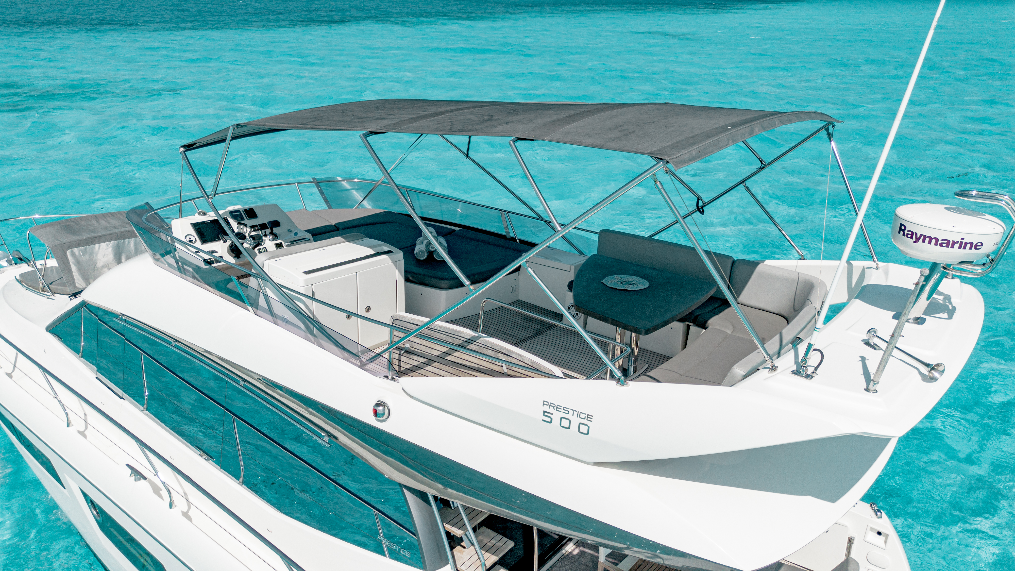 50ft Prestige yacht rental Miami - comfortable lounge area for group celebrations