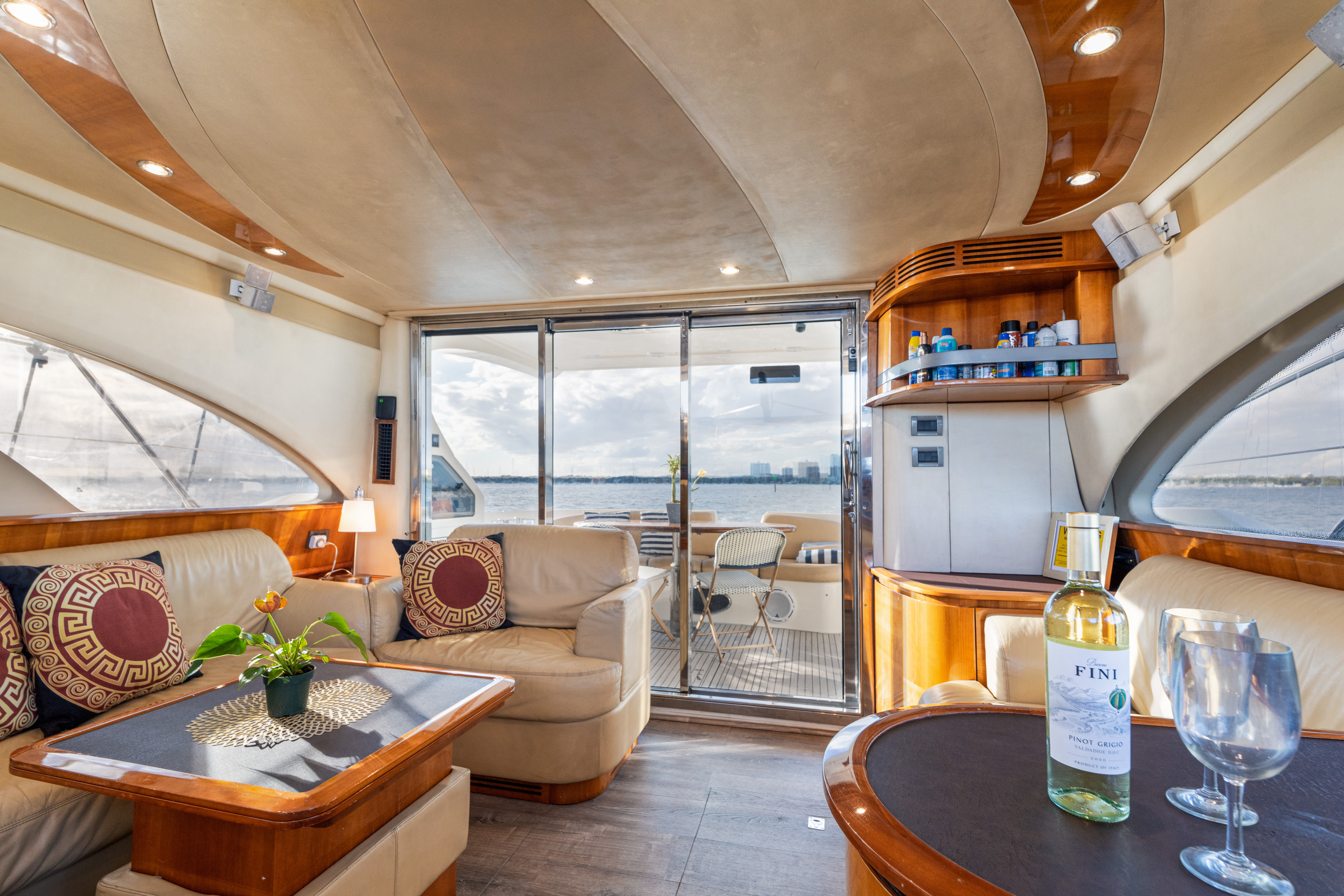 55ft Azimut G yacht rental Miami - elegant interior salon for corporate events and private gatherings