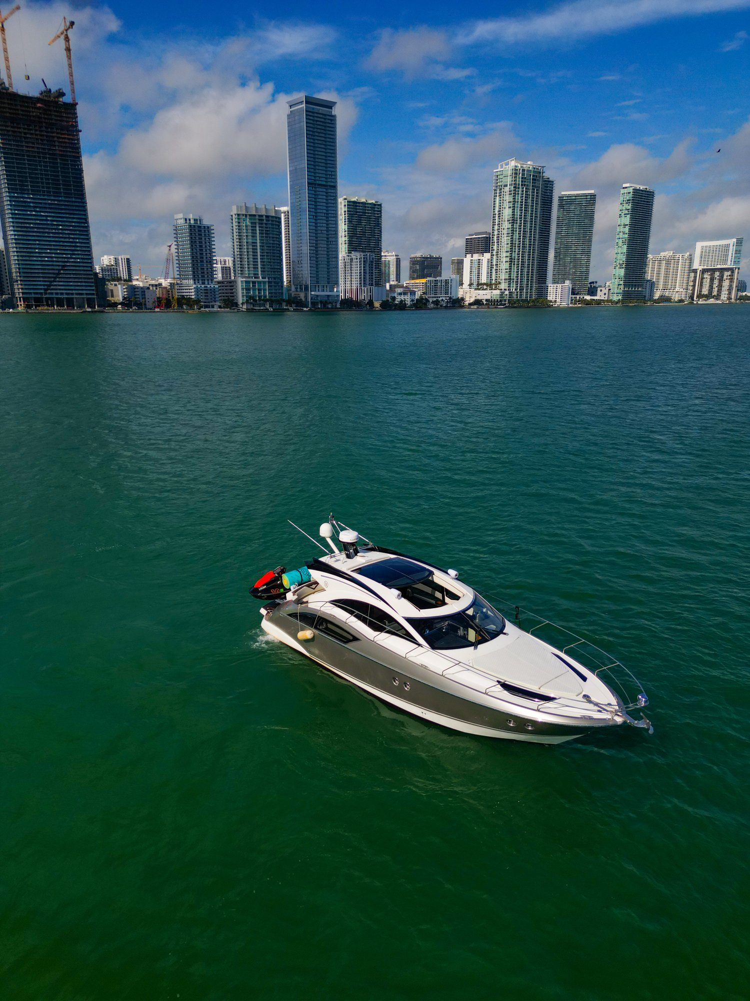 42ft Marquis Sport Coupe yacht rental Miami - comfortable lounge area for group celebrations