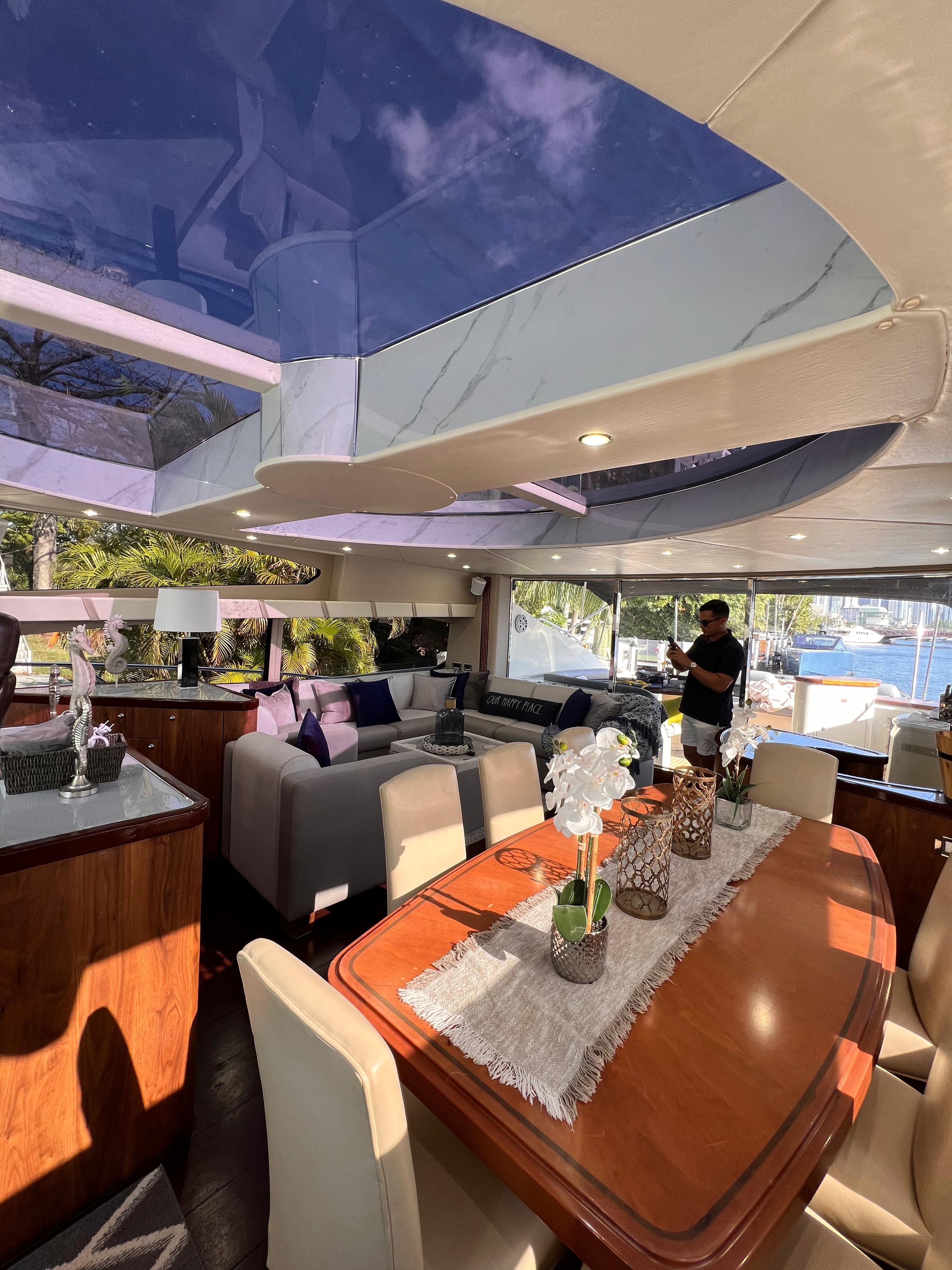 82ft Sunseeker Predator yacht rental Miami - flybridge with panoramic views of Miami skyline