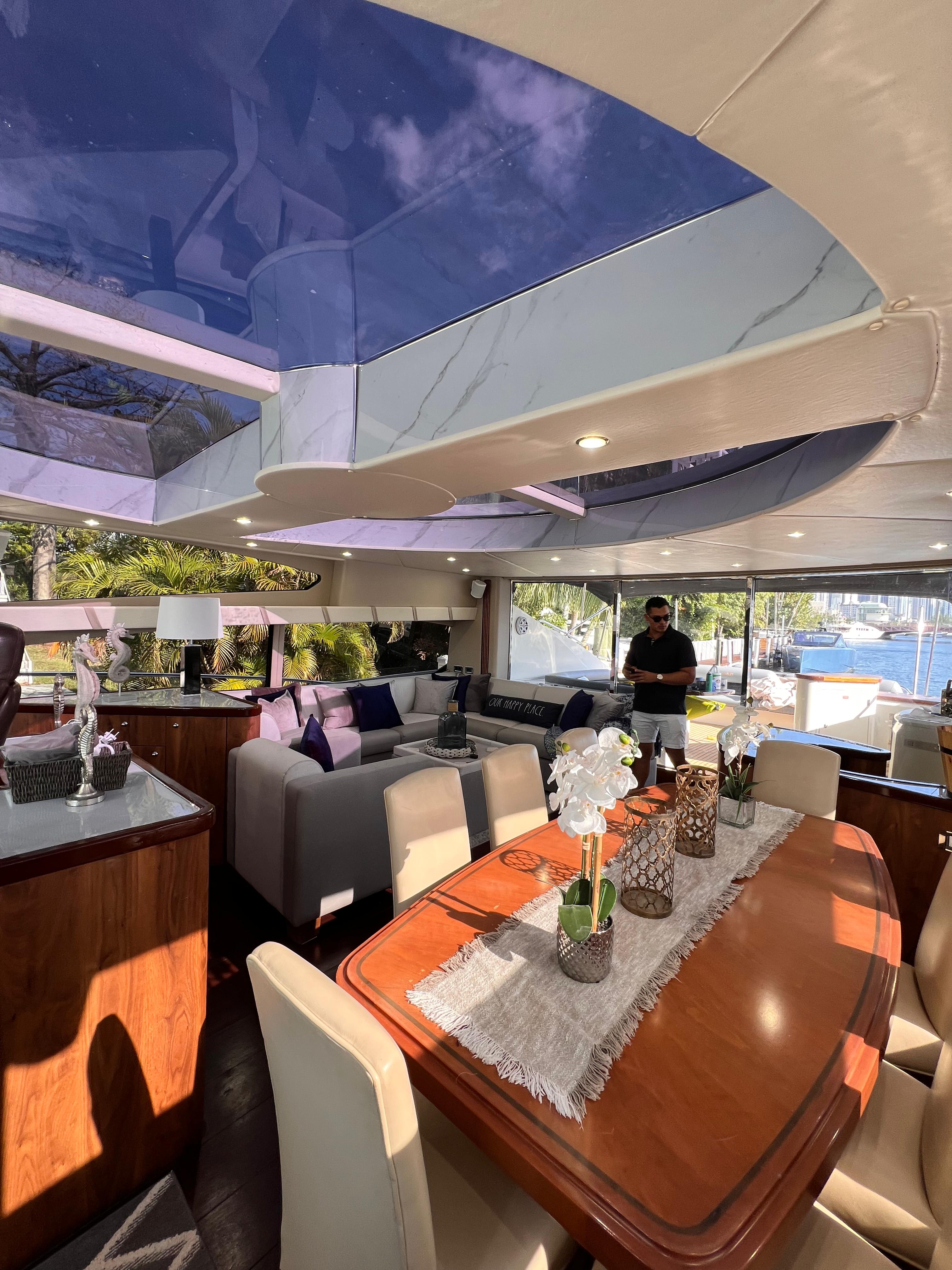 82ft Sunseeker Predator yacht rental Miami - comfortable lounge area for group celebrations