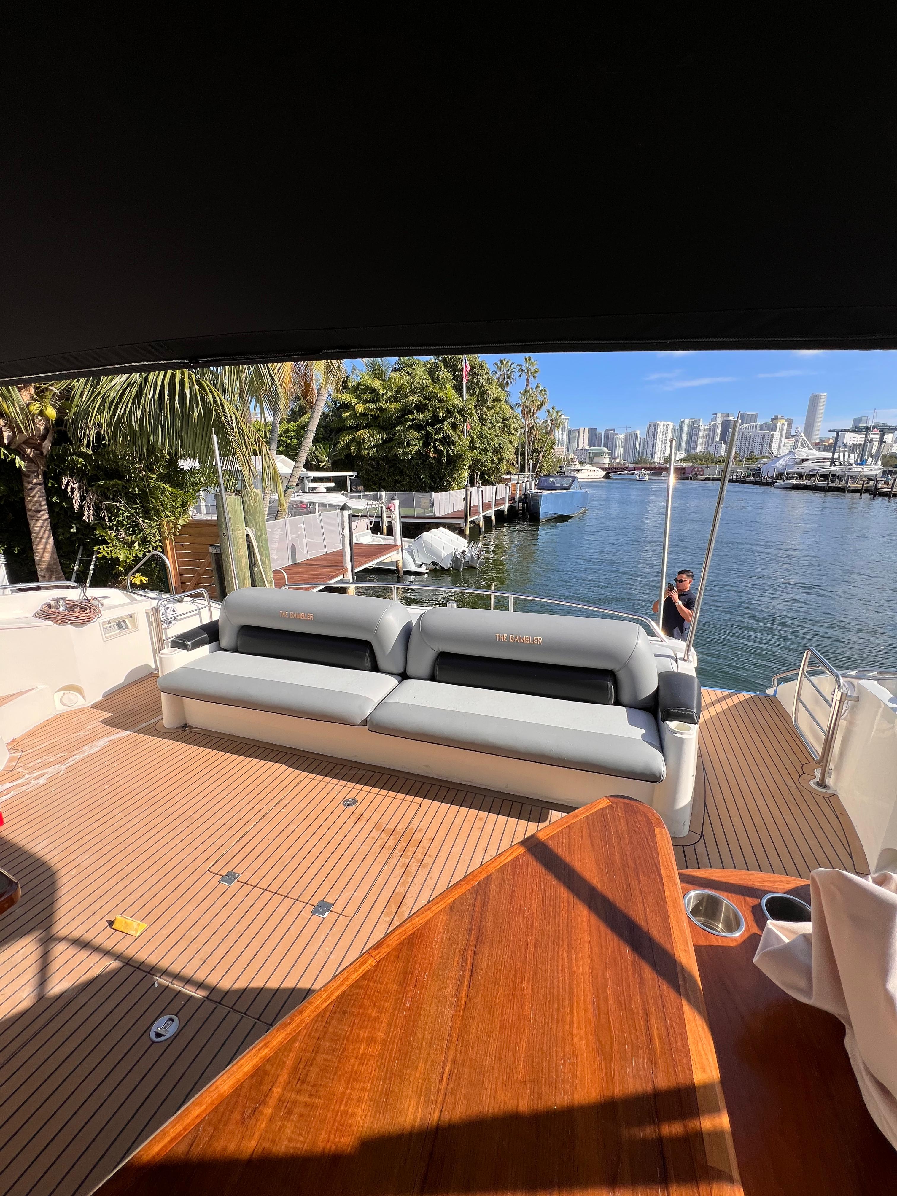 82ft Sunseeker Predator yacht rental Miami - bow seating area perfect for sunbathing and relaxation