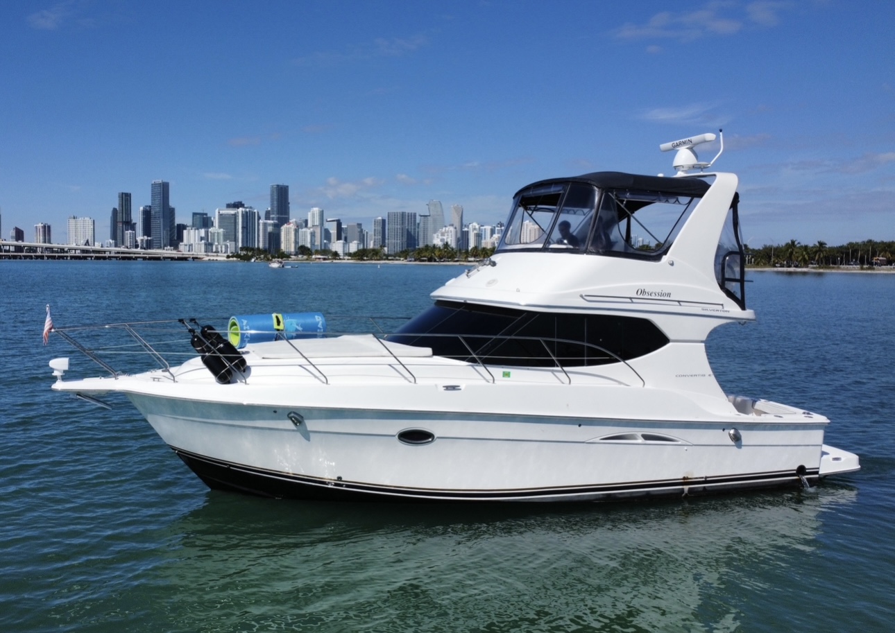 45ft Silverton Obsession yacht rental Miami - elegant interior salon for corporate events and private gatherings